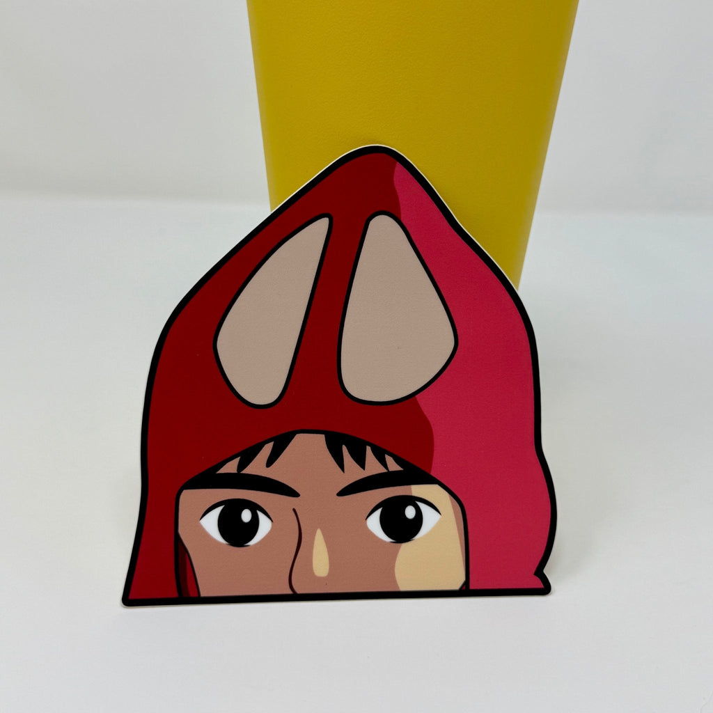 Ashitaka peeker sticker featuring his red Emishi hood and determined expression from Princess Mononoke