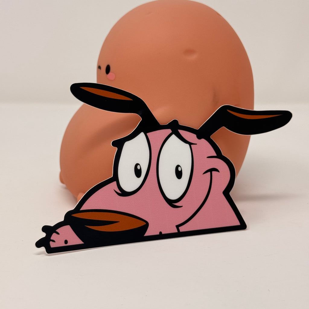 Courage the Cowardly Dog peeker sticker, perfect for collectors.