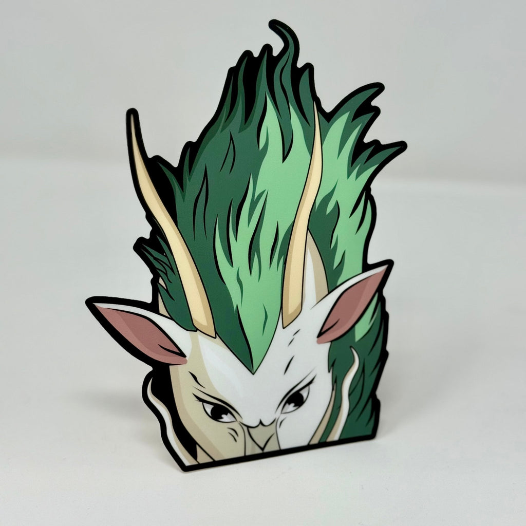 Haku Dragon peeker sticker featuring his emerald mane and ivory horns from Spirited Away