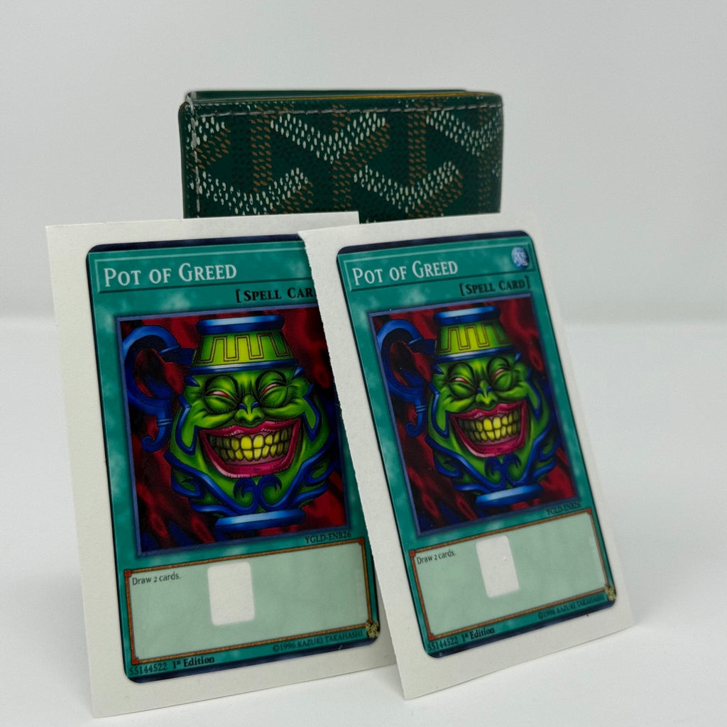 Pot of Greed credit card stickers on display, premium Yu-Gi-Oh! accessory for duelists.